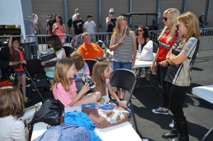 Courtney and Brittany Force with Girl Scouts