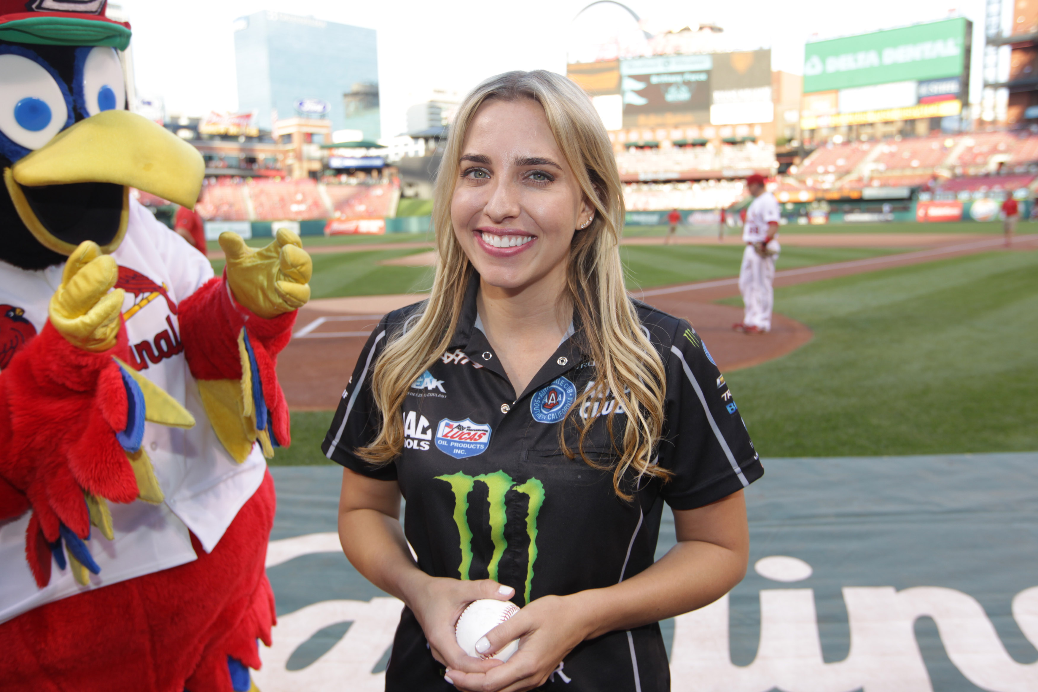 Brittany force enjoys first pitch with st. louis cardinals.